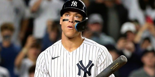 New York Yankees designated hitter Aaron Judge reacts after walking against Boston Red Sox starting pitcher Brayan Bello during the third inning of a baseball game Sunday, Sept. 25, 2022, in New York.