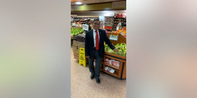 Pictured: Carlos Castro in his market. As a 25-year-old, he made the decision of a lifetime: to escape to America. He has become a successful businessman in the U.S.