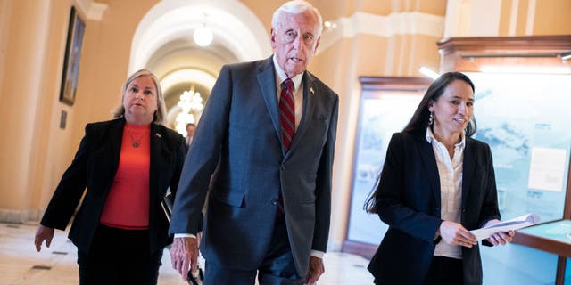 House Majority Leader Steny Hoyer, D-Md., Rep. Sharice Davids, D-Kan., right, and Rep. Susan Wild, D-Pa., arrive for a news conference on the Make It In America agenda in the U.S. Capitol on Thursday, June 23, 2022. 