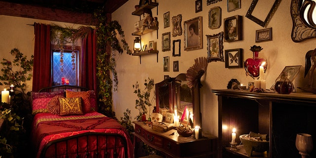 One of the bedrooms in the Hocus Pocus cottage is dark and "cozy." 