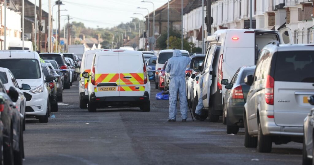 Man in joker mask seen running through garden after 2 killed in triple shooting