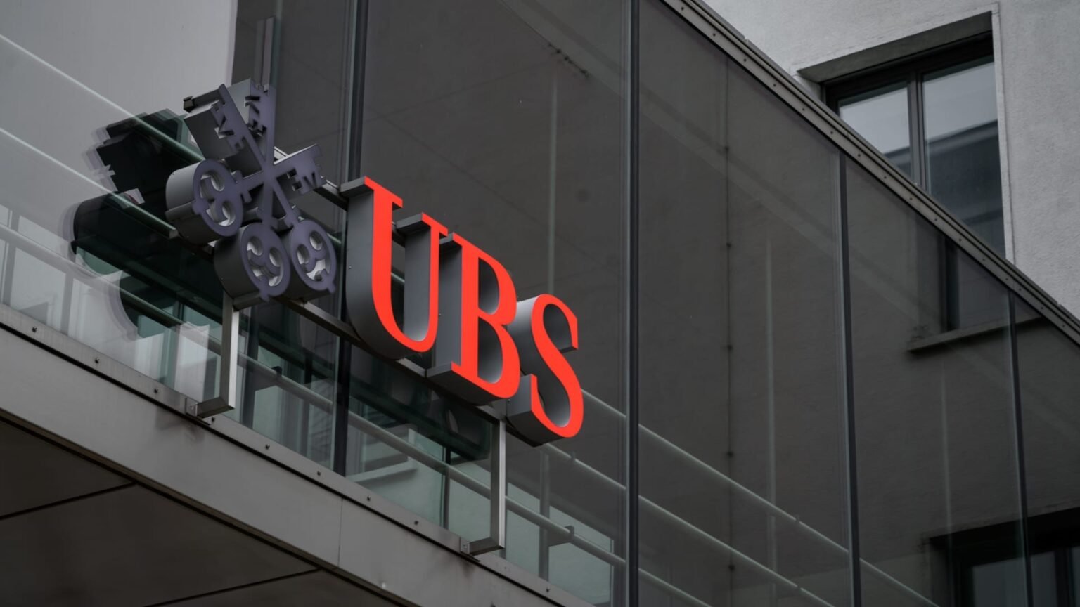 Swiss bank UBS posts 24% profit slide but beats analyst expectations
