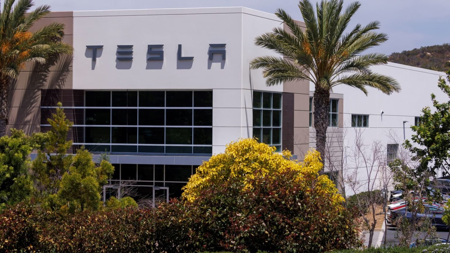 Stocks making the biggest moves midday: Tesla, Enphase Energy, Exxon Mobil and more