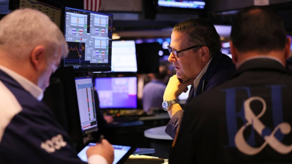 Stocks jump for third straight day, Dow rises 200 points