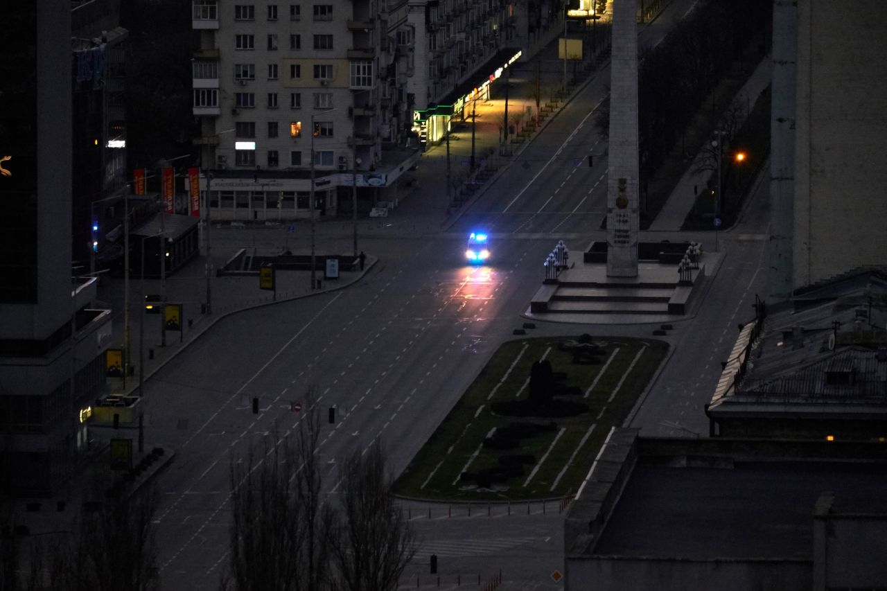 A police vehicle patrols the streets of Kyiv on February 26.