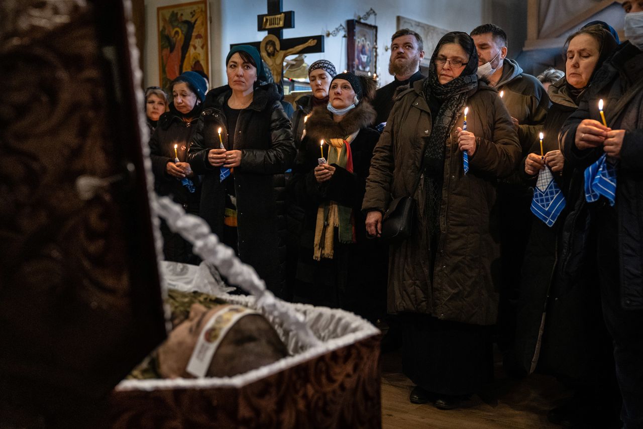 Mourners gather at a church in Kyiv on February 22 for the funeral of Ukrainian Army Capt. Anton Sydorov. The Ukrainian military said he was <a href=