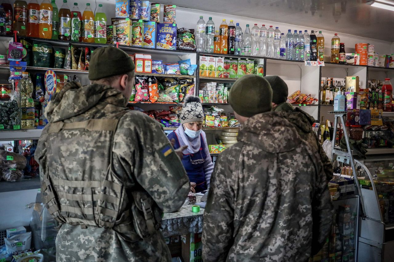 Ukrainian servicemen shop in the front-line town of Avdiivka, Ukraine, on February 21.