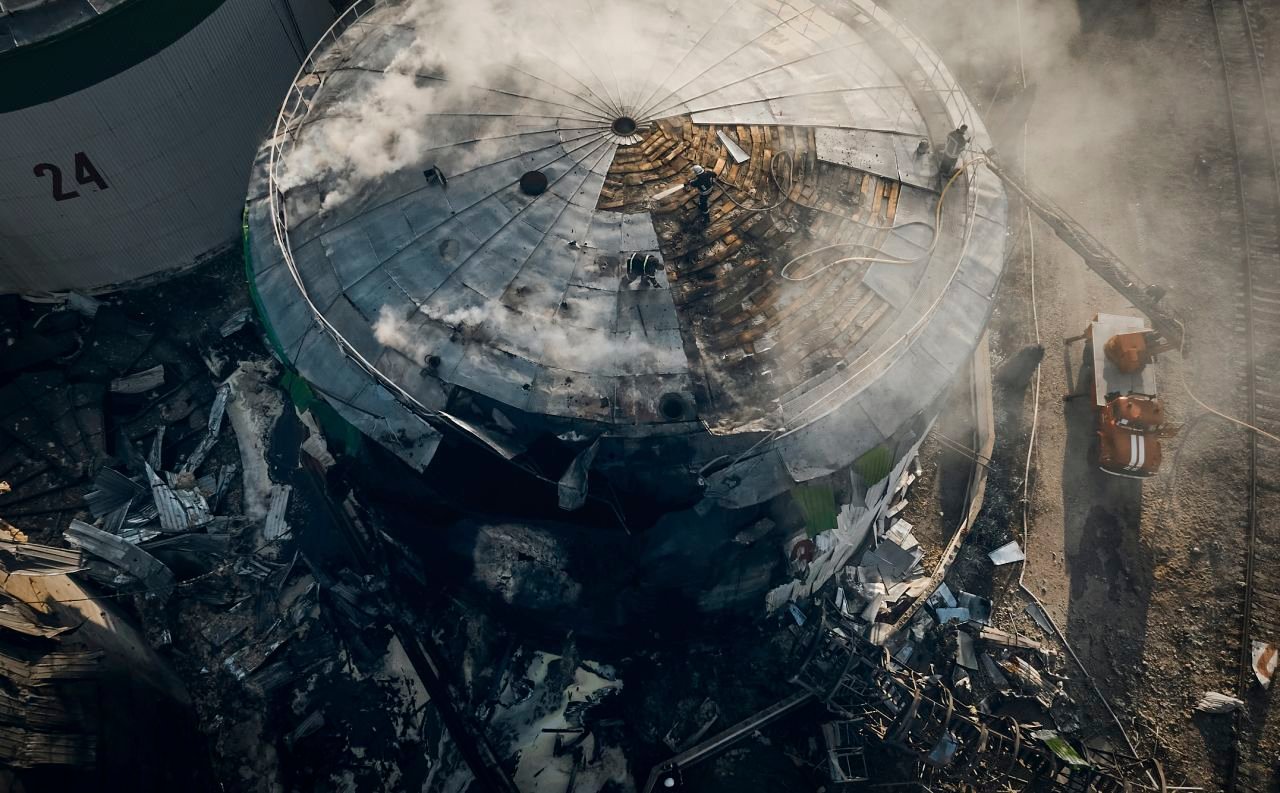 Ukrainian State Emergency Service firefighters attend to a fire at an oil depot in Mykolaiv, Ukraine, on August 2.