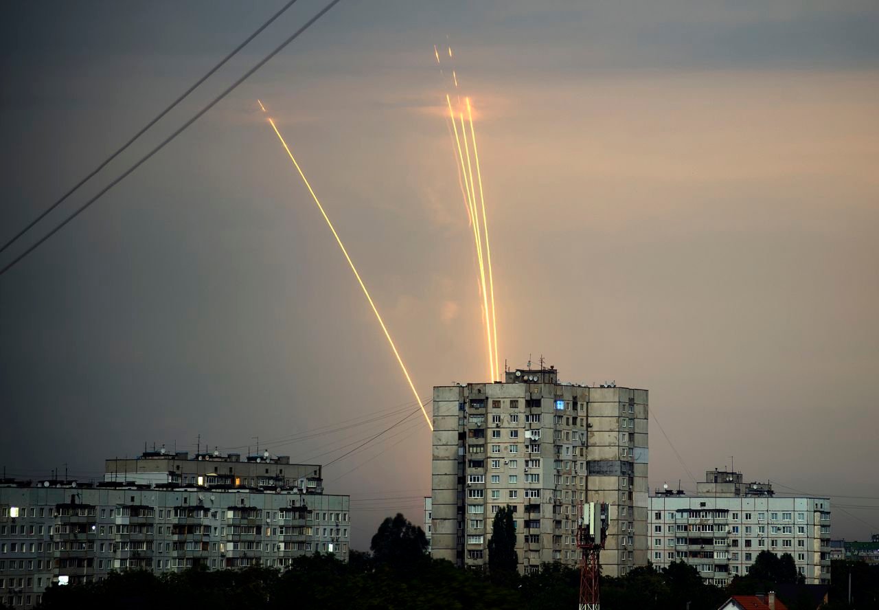Rockets launched from the Belgorod region in Russia are seen at dawn in Kharkiv, Ukraine, on August 15.