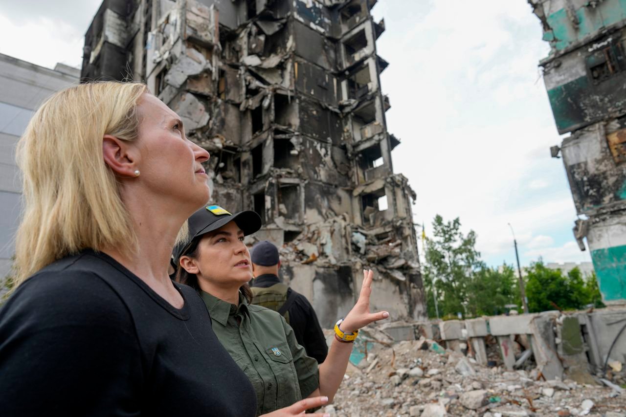 U.S. ambassador to Ukraine Bridget Brink, left, listens to Ukraine's Prosecutor General Iryna Venediktov during a tour of Borodyanka, Ukraine, on June 4.