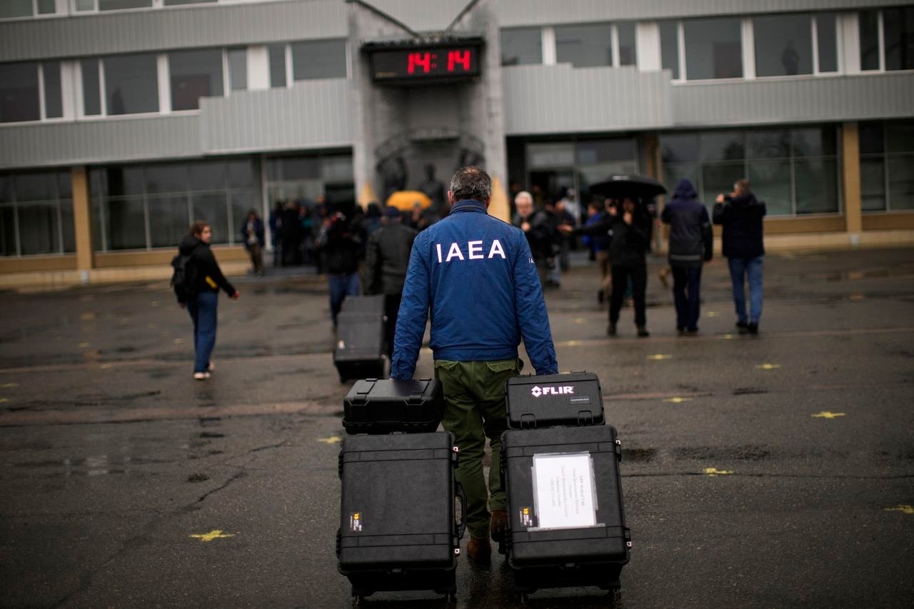 A team member with the International Atomic Energy Agency arrives at the Chernobyl nuclear power plant in Chernobyl, Ukraine, on April 26. Russian forces withdrew from Chernobyl, the site of the world's worst nuclear disaster, in March.