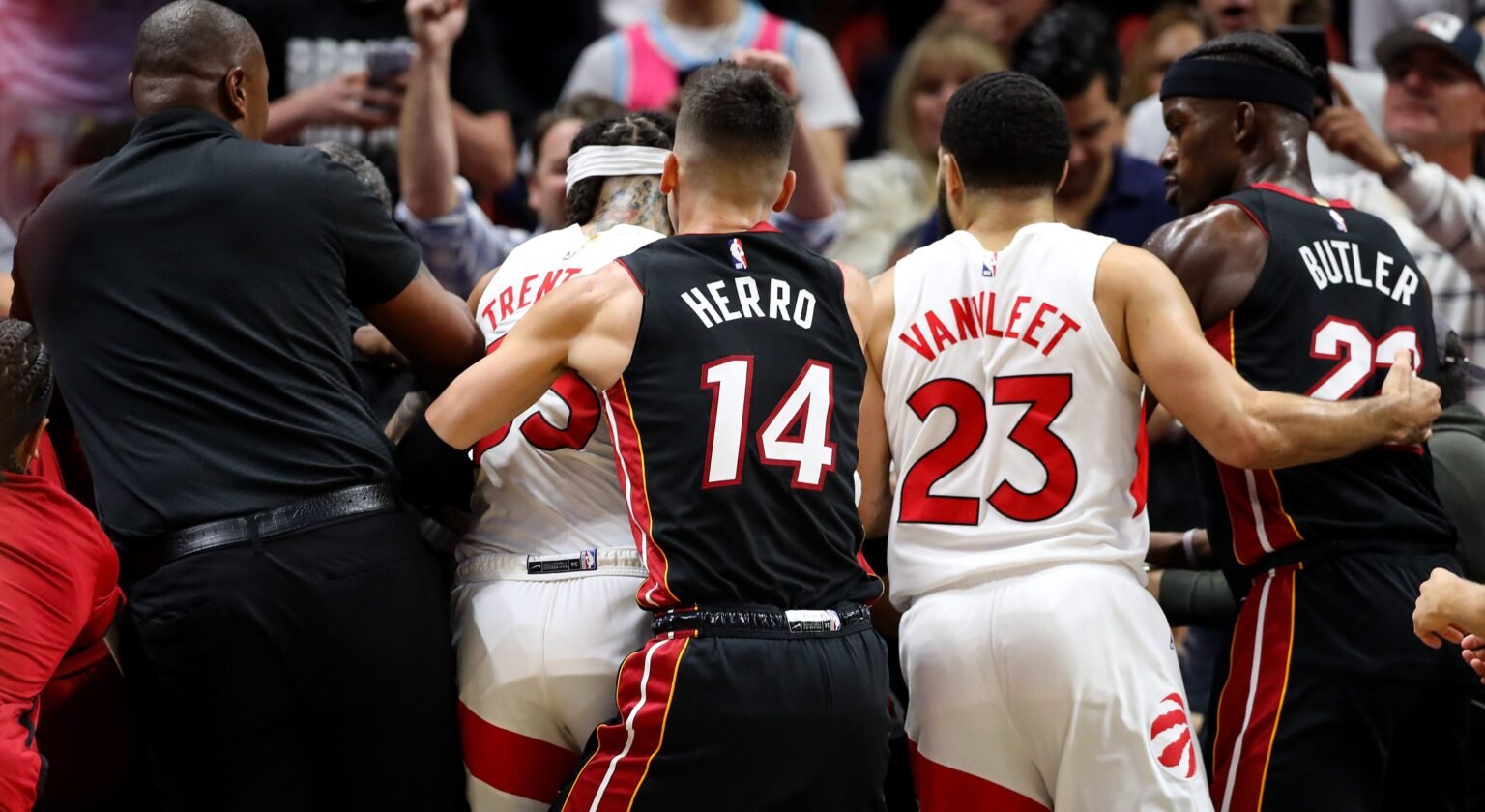 Heat’s Caleb Martin tackles Raptors’ Christian Koloko into stands, leads to wild skirmish