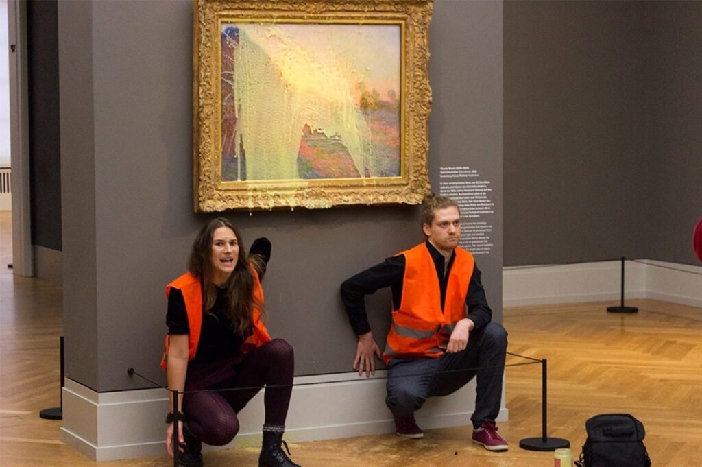 German climate change activists splash mashed potatoes on Monet painting