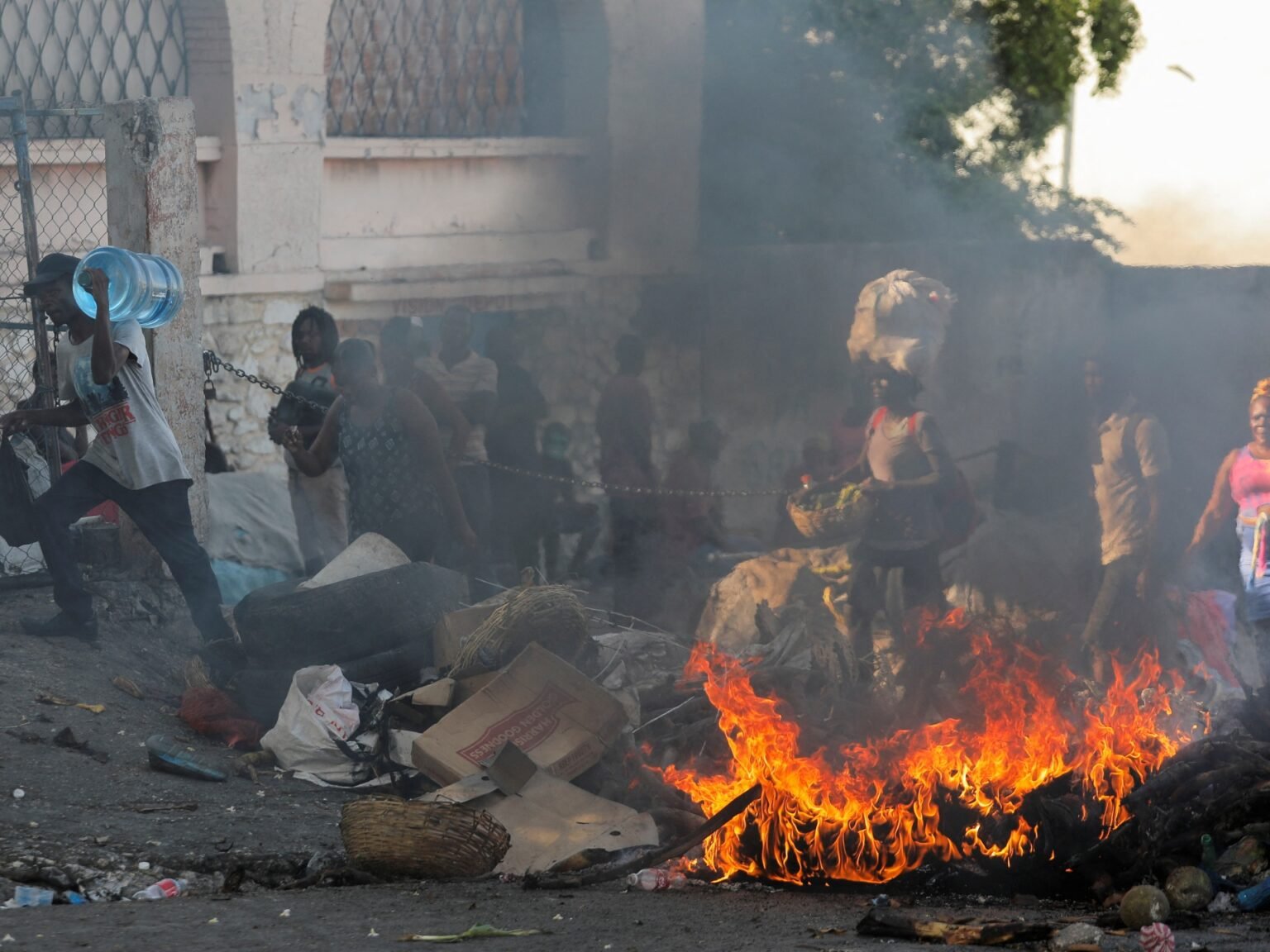 Haitian police use tear gas as thousands march in Port-au-Prince