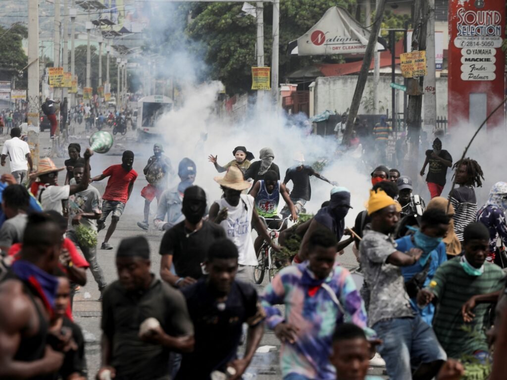 Haitians protest against government call for foreign intervention