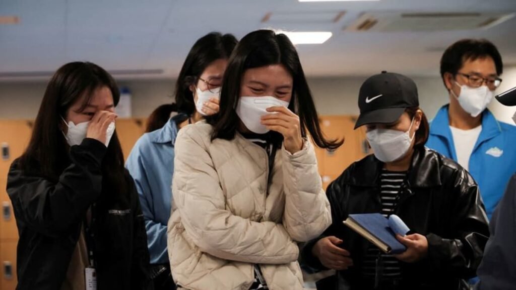 After Halloween stampede in South Korea, families seek missing loved ones, plan funerals