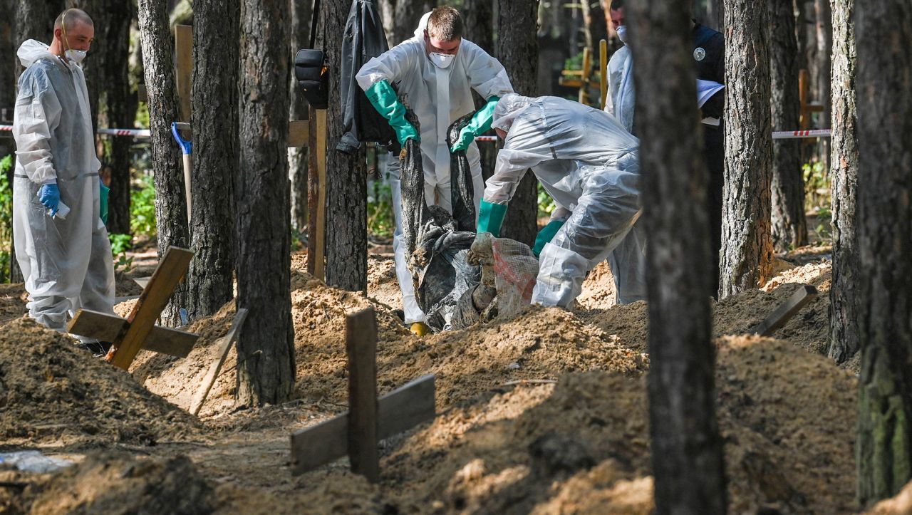 Forensic technicians operate at the site of a <a href=
