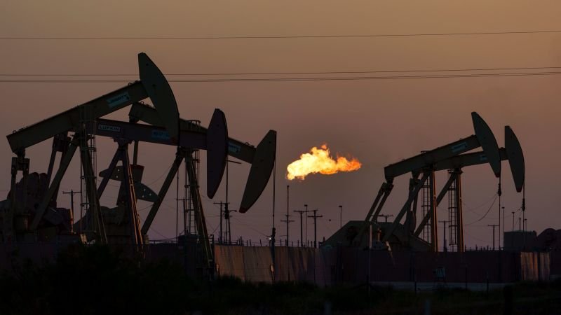 Exxon illegally fired two scientists suspected of leaking information to WSJ, Labor Department says