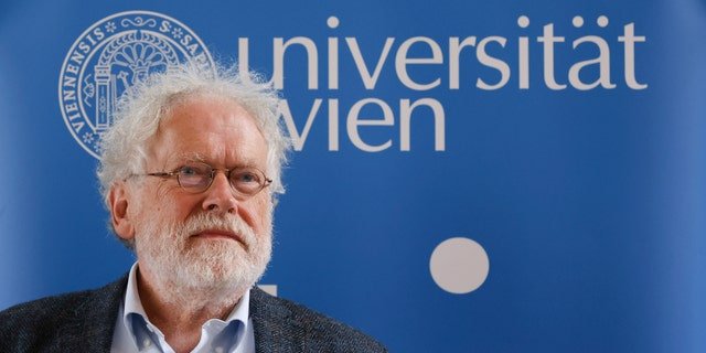 Professor Anton Zeilinger from the University of Vienna arrives for a news conference at the Institute for Quantum Optics and Quantum Information in Vienna, Austria, Tuesday, Oct. 4, 2022.