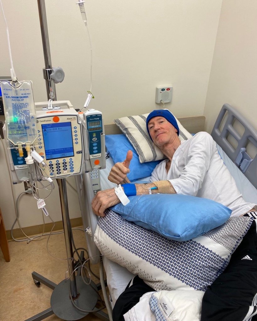 McGuirk seen in a hospital bed