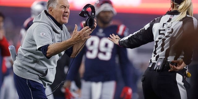 New England Patriots head coach Bill Belichick argues a call during the second half of an NFL football game against the Chicago Bears, Monday, Oct. 24, 2022, in Foxborough, Mass.