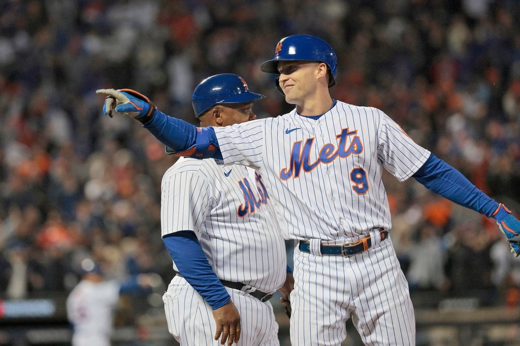 Mets center fielder Brandon Nimmo reacts after hitting an RBI single in the fourth inning of Game 2 of the wild-card round against the Padres on Oct. 8, 2022.