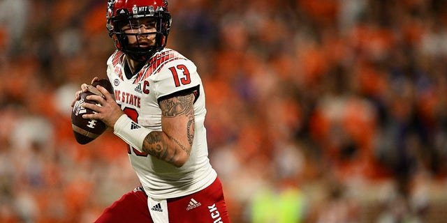 Devin Leary of the North Carolina State Wolfpack looks to pass in the second quarter against the Clemson Tigers at Memorial Stadium Oct. 1, 2022, in Clemson, S.C.