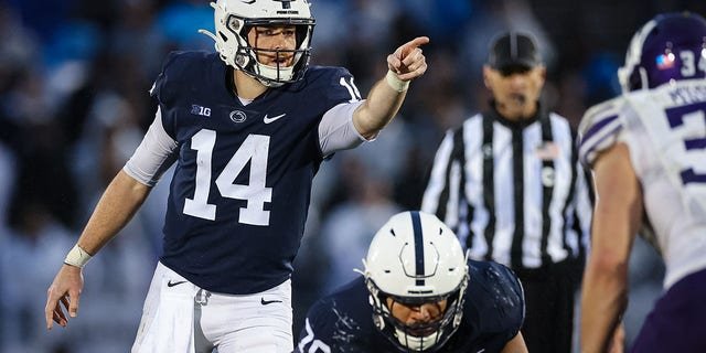Sean Clifford of the Penn State Nittany Lions signals to teammates before a play against the Northwestern Wildcats during the second half at Beaver Stadium Oct. 1, 2022, in State College, Pa.