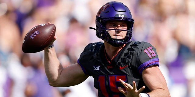 Max Duggan, #15 of the TCU Horned Frogs, throws against the Oklahoma State Cowboys during the first half at Amon G. Carter Stadium on Oct. 15, 2022 in Fort Worth, Texas.