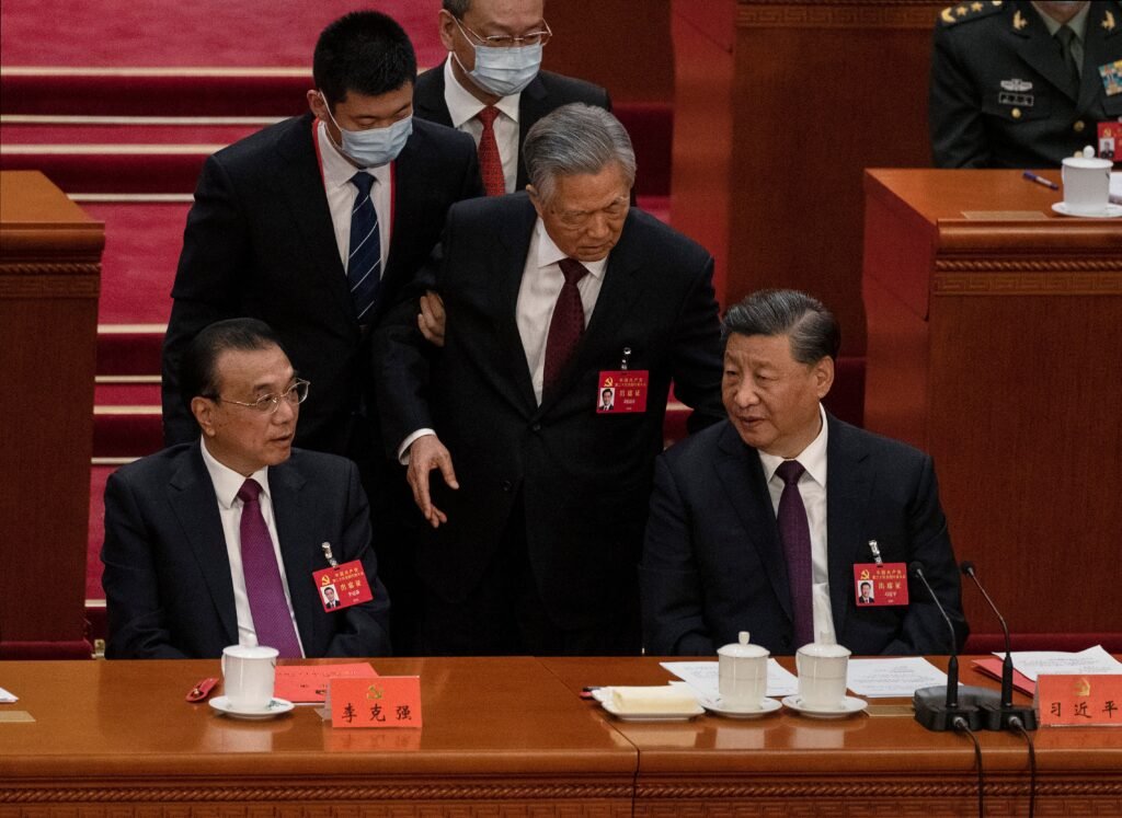 Drama at Chinese Communist Party summit: Xi predecessor Hu Jintao hauled out