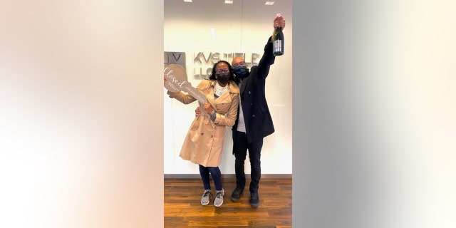 Micah and her husband, Demetrius, are shown celebrating when they closed on their new home in Maryland.