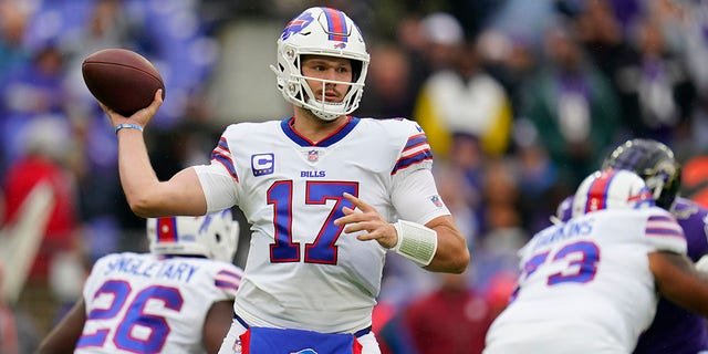 Buffalo Bills quarterback Josh Allen (17) passes against the Baltimore Ravens in the first half of an NFL football game Sunday, Oct. 2, 2022, in Baltimore.