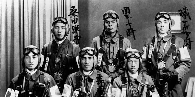 Determination and pride show in the faces of these young Japanese pilots trained as kamikaze flyers. The suicide pilots crashed planes loaded down with explosives, extra fuel and special missiles into enemy ships. Kamikaze, "Divine Wind," refers to a typhoon that swept Mongol invaders away from the Japanese coast in the 13th century.
