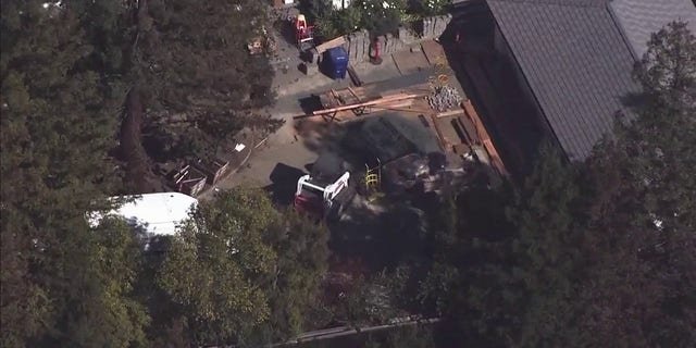 Police found a Mercedes buried under a California lawn Friday, Oct. 21, 2022.