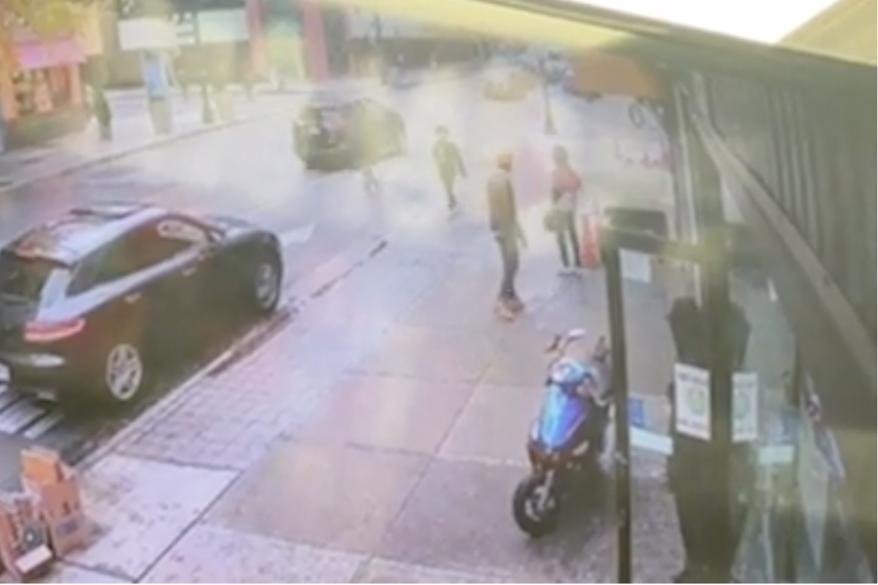The 70-year-old was hit after one man opened fire at another man on Fulton Street.