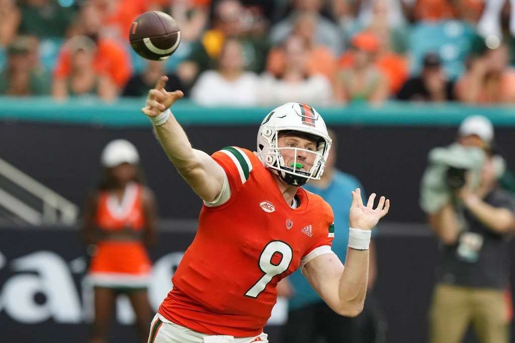 Tyler Van Dyke #9 of the Miami Hurricanes attempts a pass during the first half against the Middle Tennessee Blue Raiders at Hard Rock Stadium on September 24, 2022 in Miami Gardens, Florida. 