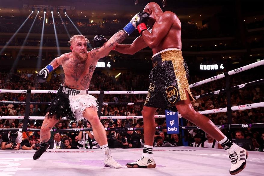 Jake Paul (left) and Anderson Silva during their fight on Saturday, Oct. 29, 2022.