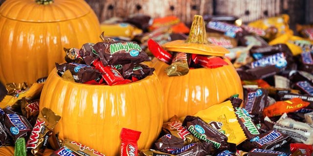 Ask your young trick-or-treaters a few questions about how they feel about paying taxes (or giving up candy).