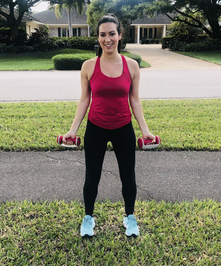 woman doing bicep curls