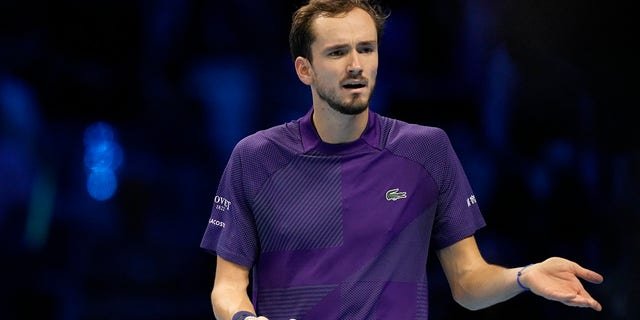 Daniil Medvedev reacts after losing a point against Andrey Rublev during the ATP World Tour Finals in Turin, Italy, Monday, Nov. 14, 2022.