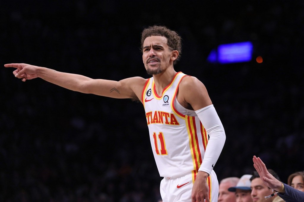 Trae Young reacts during the Hawks' loss to the Nets.