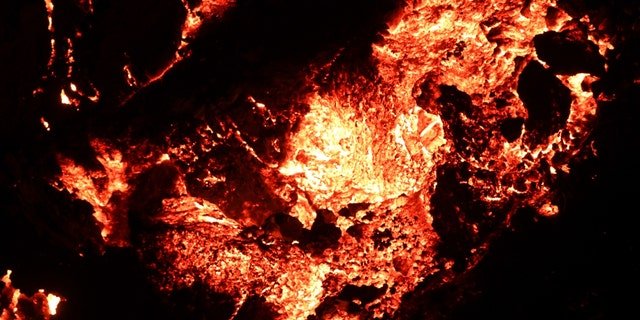 A view from Mauna Loa, the world's largest active volcano, began to erupt overnight, prompting authorities to open shelters "as a precaution" on November 30, 2022 in Big Island of Hawaii.