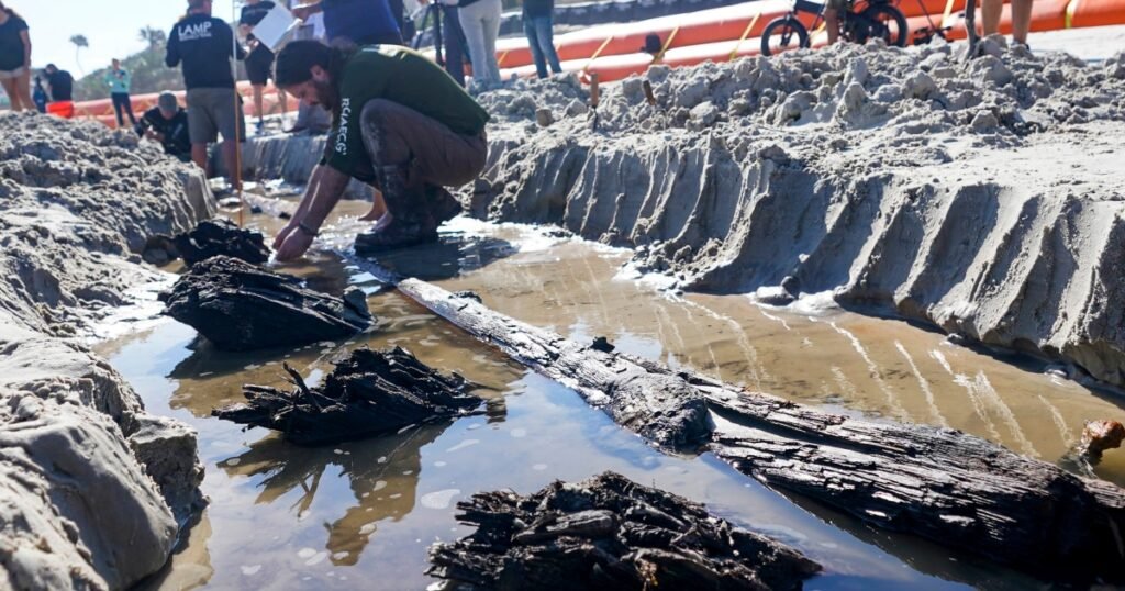 Wooden ship from 1800s uncovered on Florida beach after erosion caused by recent hurricanes
