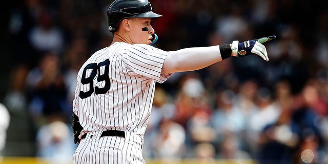 New York Yankees right fielder Aaron Judge reacts after hitting a double against the Minnesota Twins at Yankee Stadium in New York on Sept. 5, 2022.