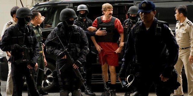Russian arms dealer Viktor Bout arrives at a Criminal Court in Bangkok on October 5, 2010.