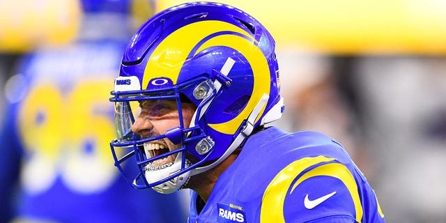 Los Angeles Rams quarterback Baker Mayfield (17) celebrates after throwing the game-winning touchdown pass during the NFL game between the Las Vegas Raiders and the Los Angeles Rams on December 8, 2022, at SoFi Stadium in Inglewood, CA.