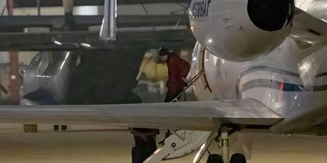 American basketball star Brittney Griner gets out of a plane after landing at the JBSA-Kelly Field Annex runway on December 9, 2022 in San Antonio, after she was released from a Russian prison in exchange for a notorious arms dealer.