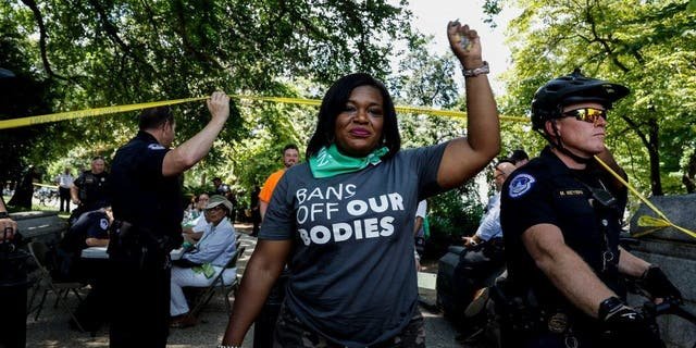 Rep. Cori Bush (D-MO) leaves a processing area after being arrested for participating in a sit in with activists from Center for Popular Democracy Action in front of the U.S. Supreme Court Building on July 19, 2022, in Washington, D.C.