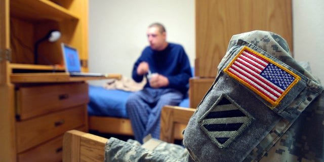 Army Cpl. Jesse Pelayo in his quarters, May 1, 2008, in Fort Stewart, Georgia.