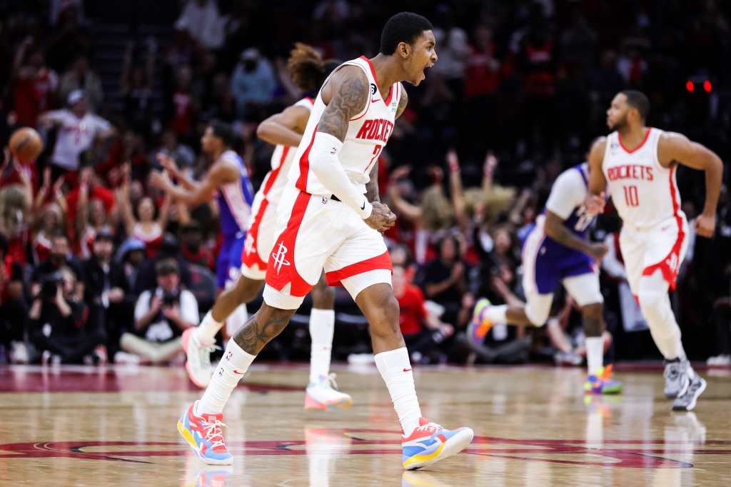 Kevin Porter Jr. #3 of the Houston Rockets reacts after making a basket in double overtime against the Philadelphia 76ers